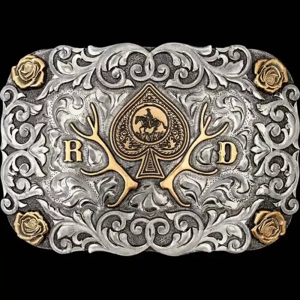 "Our Goldendale Buckle is an elegant and classic piece to show off your personal western style. Crafted on a hand-engraved, German Silver base with a light antique finish. It is detailed with gorgeous German Silver overlays, Jeweler's Bronze flowers 